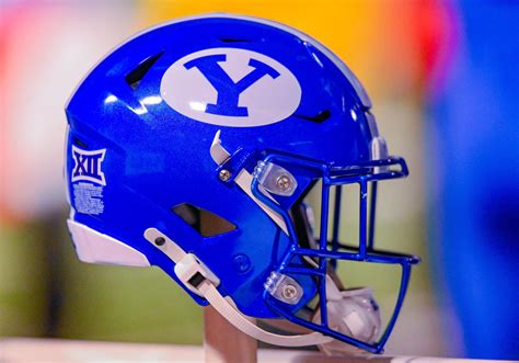 Water bottle hits BYU Cheer coach 